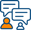 Two people with speech bubbles for implementation and accompaniment.